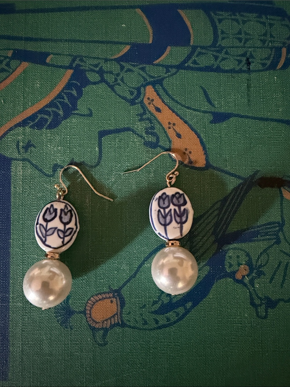Blue and white tulip earrings with a pearl drop